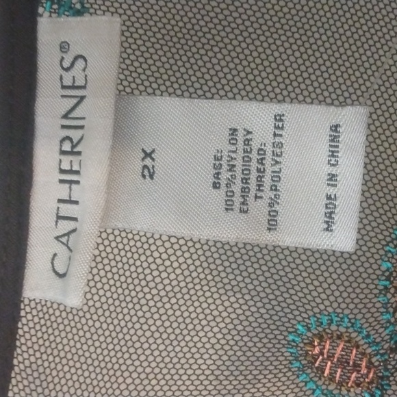 Catherine's black, nylon jacket. - Picture 2 of 4